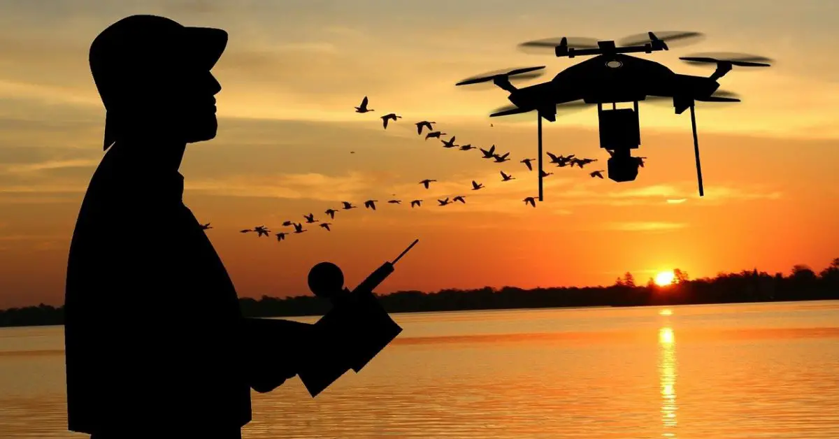 Man flying drone in the sunset