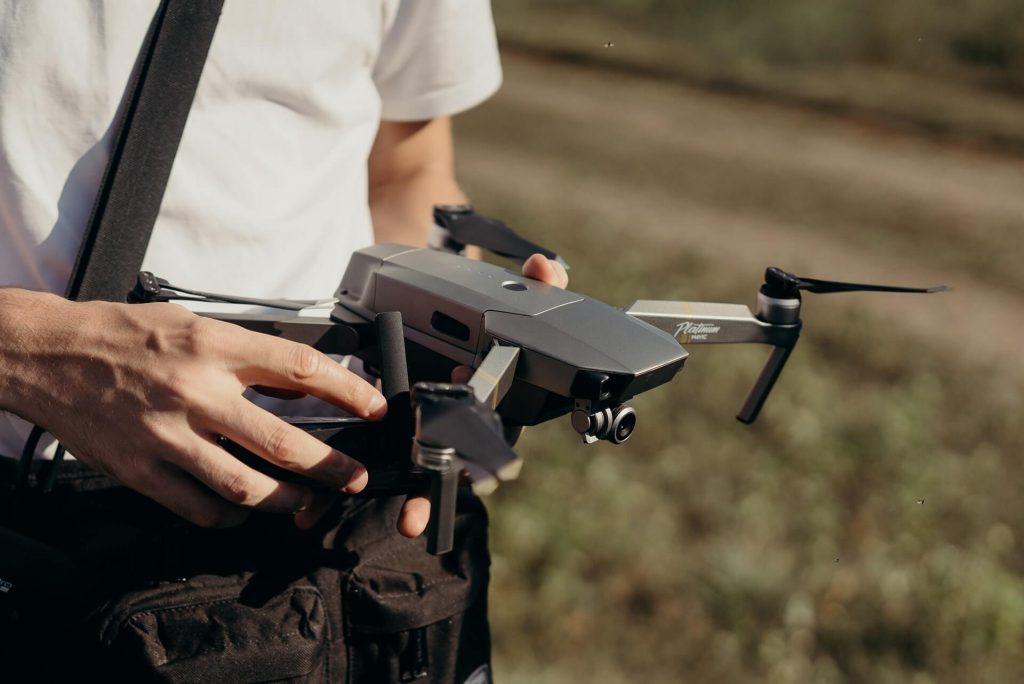 Person holding drone
