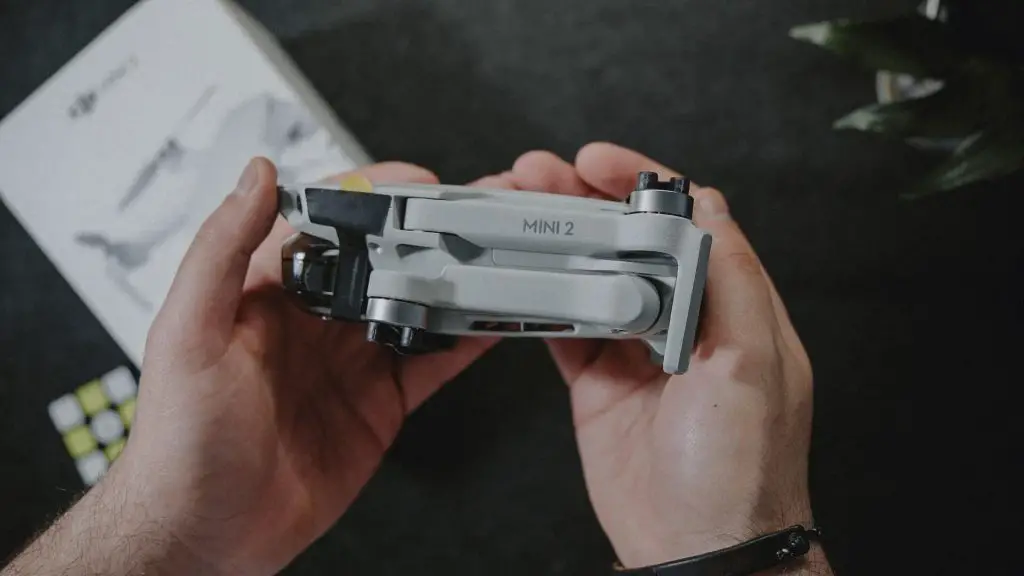 DJI Mini 2 held in a person's hand